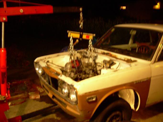 Name:  enginecomingout.jpg
Views: 79
Size:  38.2 KB